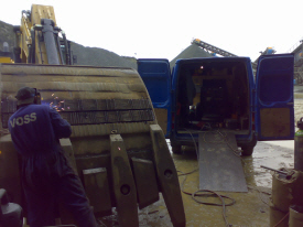 Welding Large Bucket on Site in Quarry